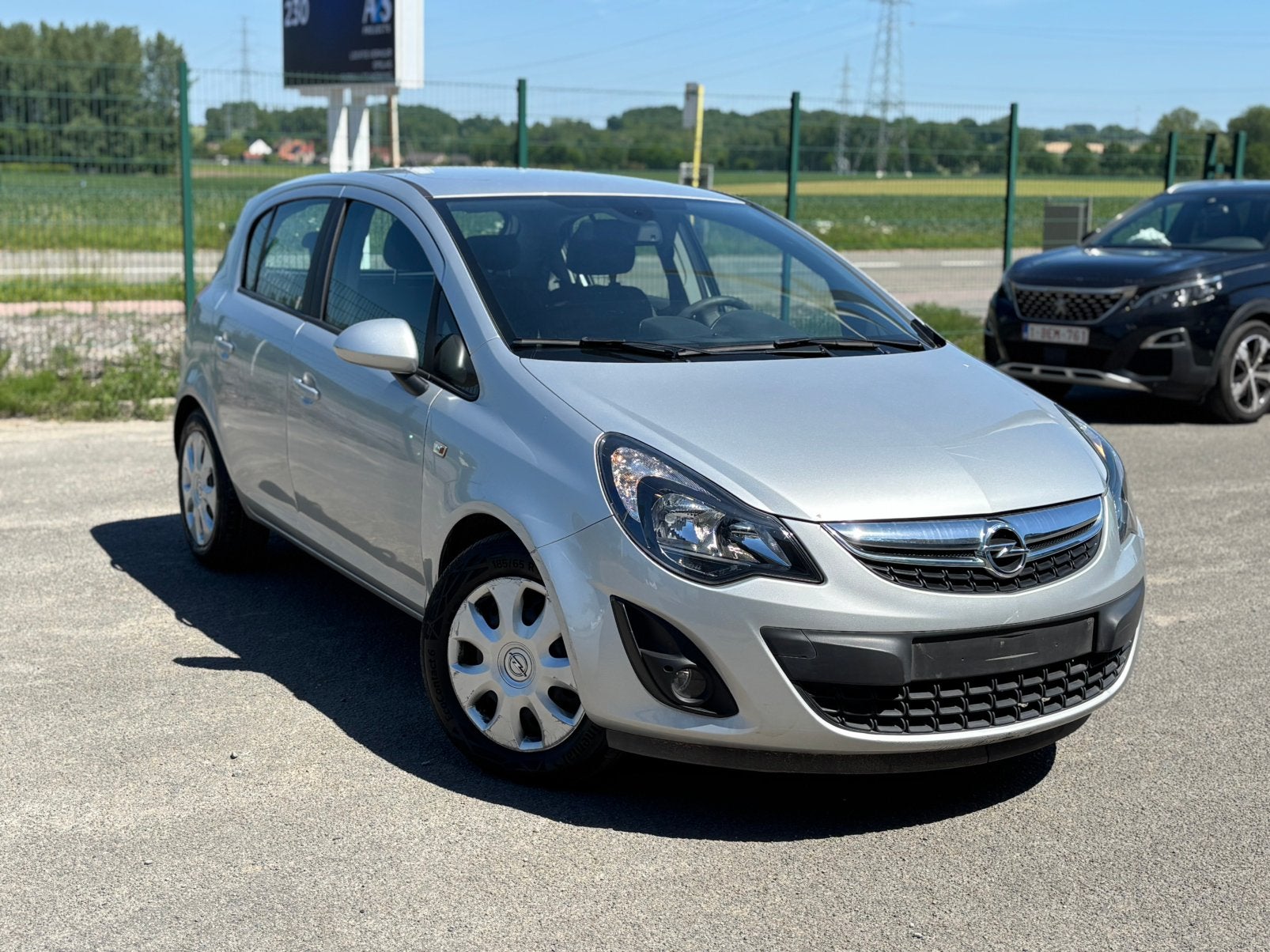Opel Corsa Cosmo 2014 1.4 essence Airco LEZ Ok 97000km, Euro 5, 50 kW, 996 cc, Bedrijf
