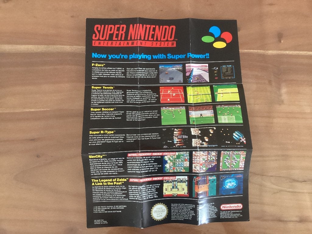 Poster folder Nintendo SNES 1991, Ophalen of Verzenden, Gebruikt
