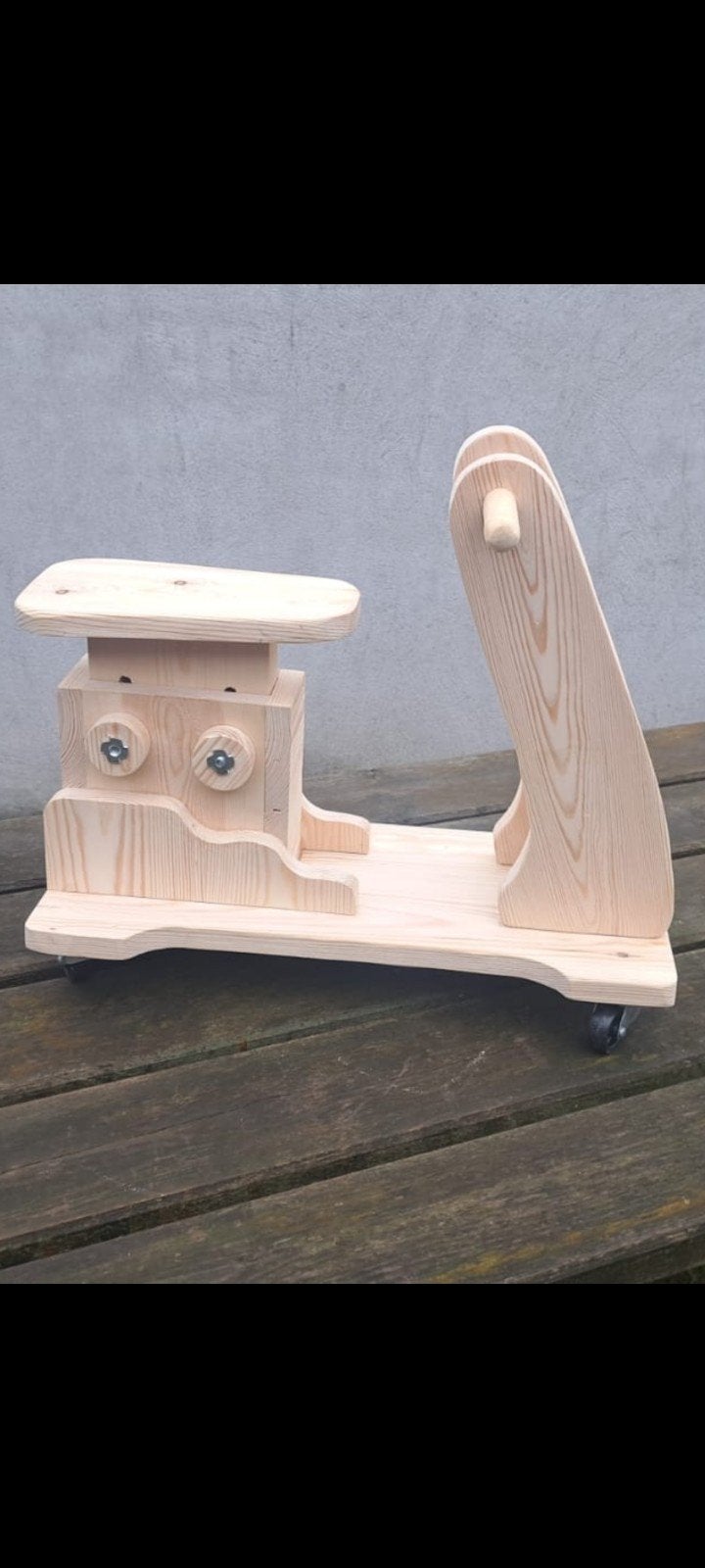 Houten ( beuk) loopfietsje, Ophalen