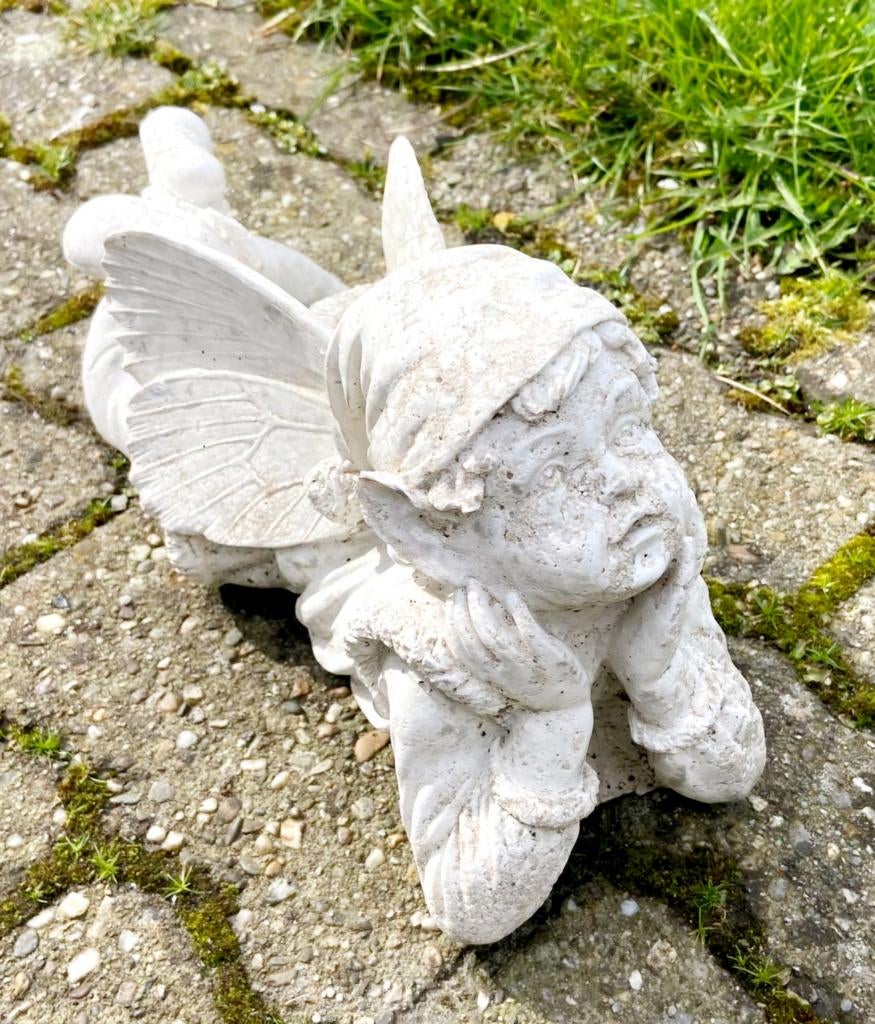 Fée de jardin en béton, Enlèvement