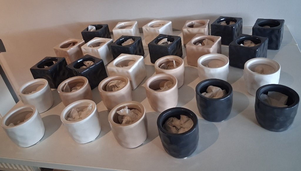 28 kleine bloempotjes, Ophalen