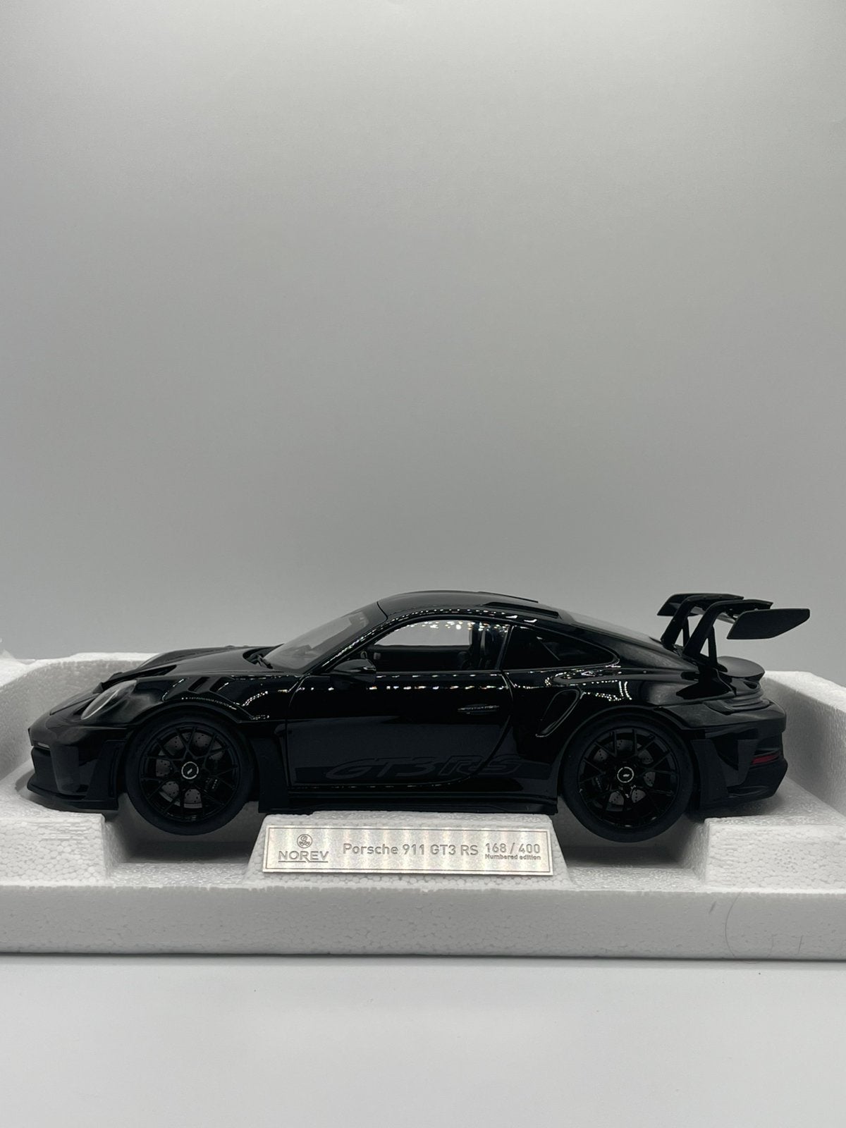 Porsche 992 GT3 RS volledig zwart Norev 1/18, Ophalen, Zo goed als nieuw, Norev