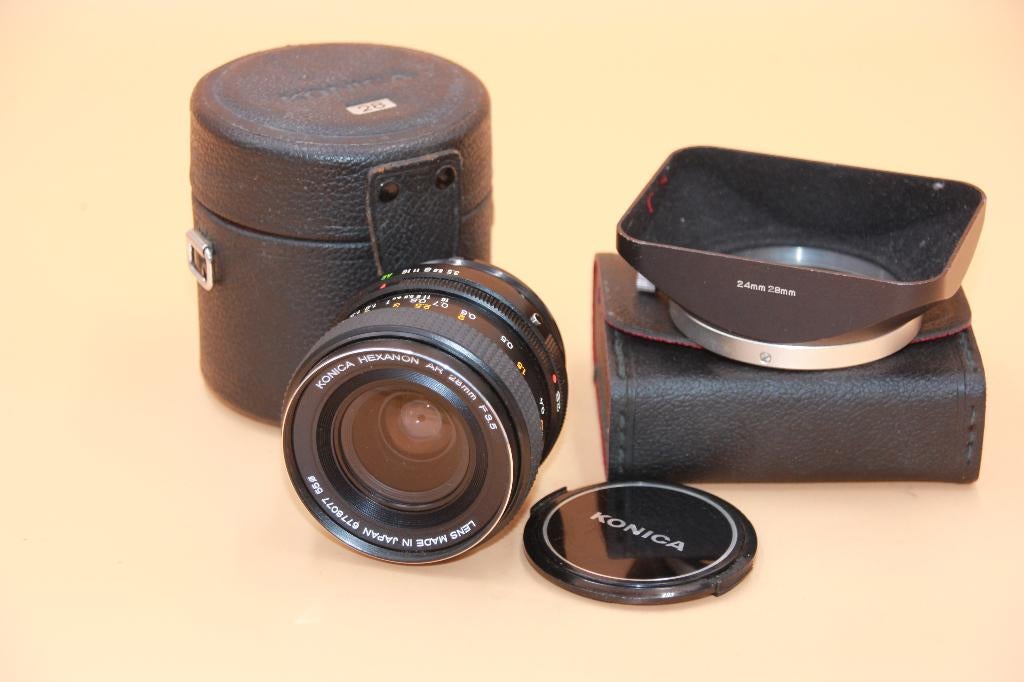 KONICA AR HEXANON 28/3.5 + pare soleil, TV, Hi-fi & Vidéo, Appareils photo analogiques, Comme neuf, Reflex miroir, Konica, Enlèvement ou Envoi