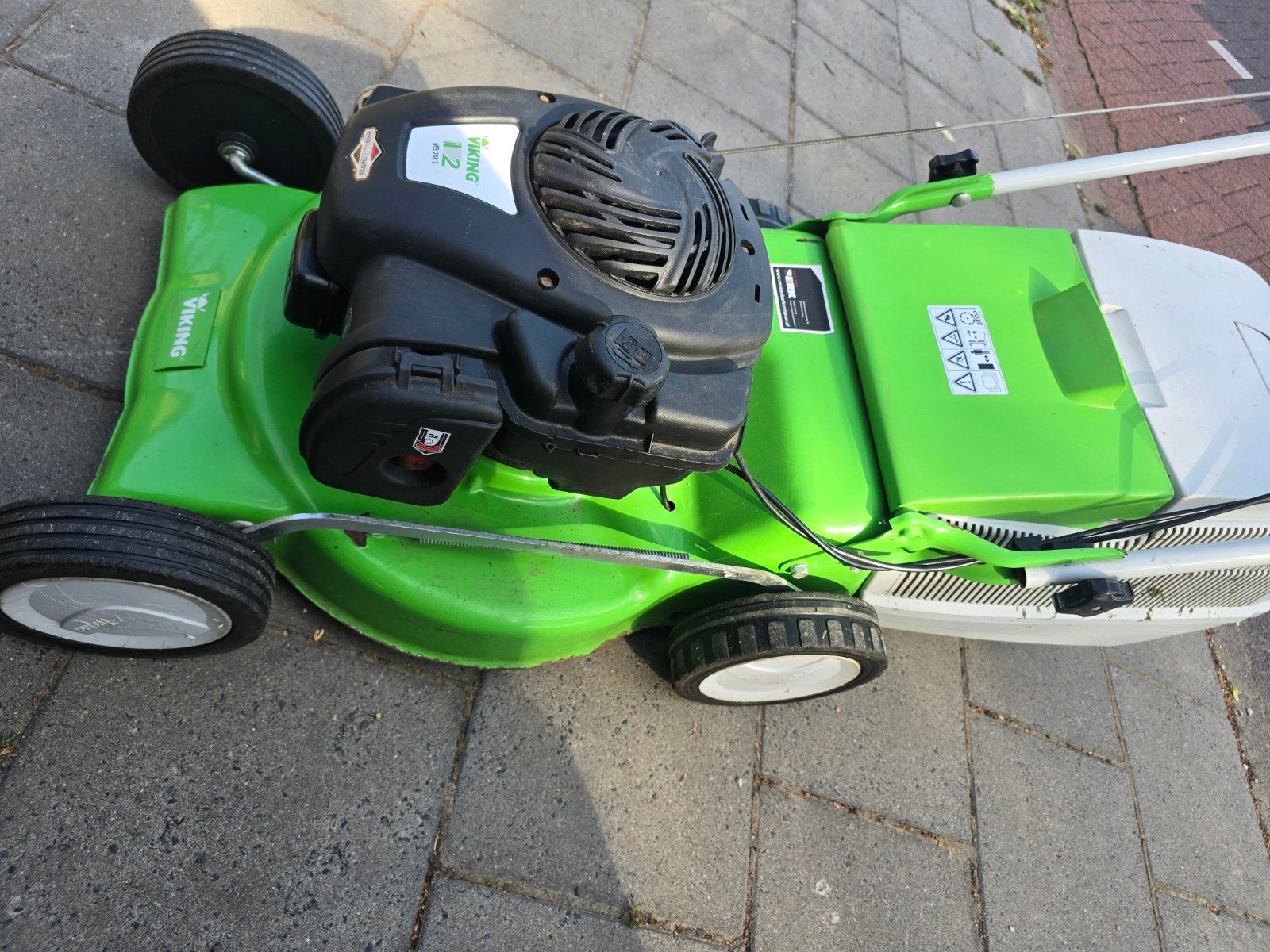 Grasmaaier, Ophalen