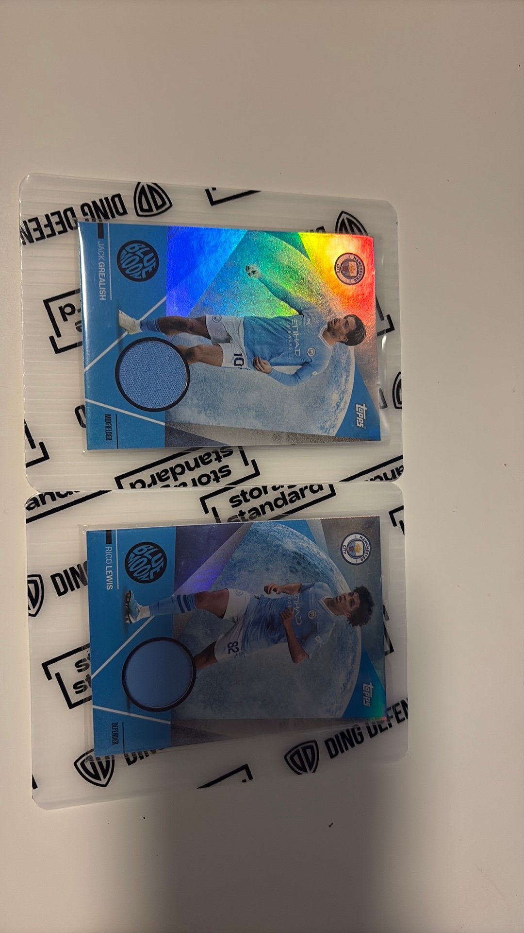 Player worn jack grealish match worn rico lewis, Ophalen of Verzenden, Zo goed als nieuw, Losse kaart, Foil