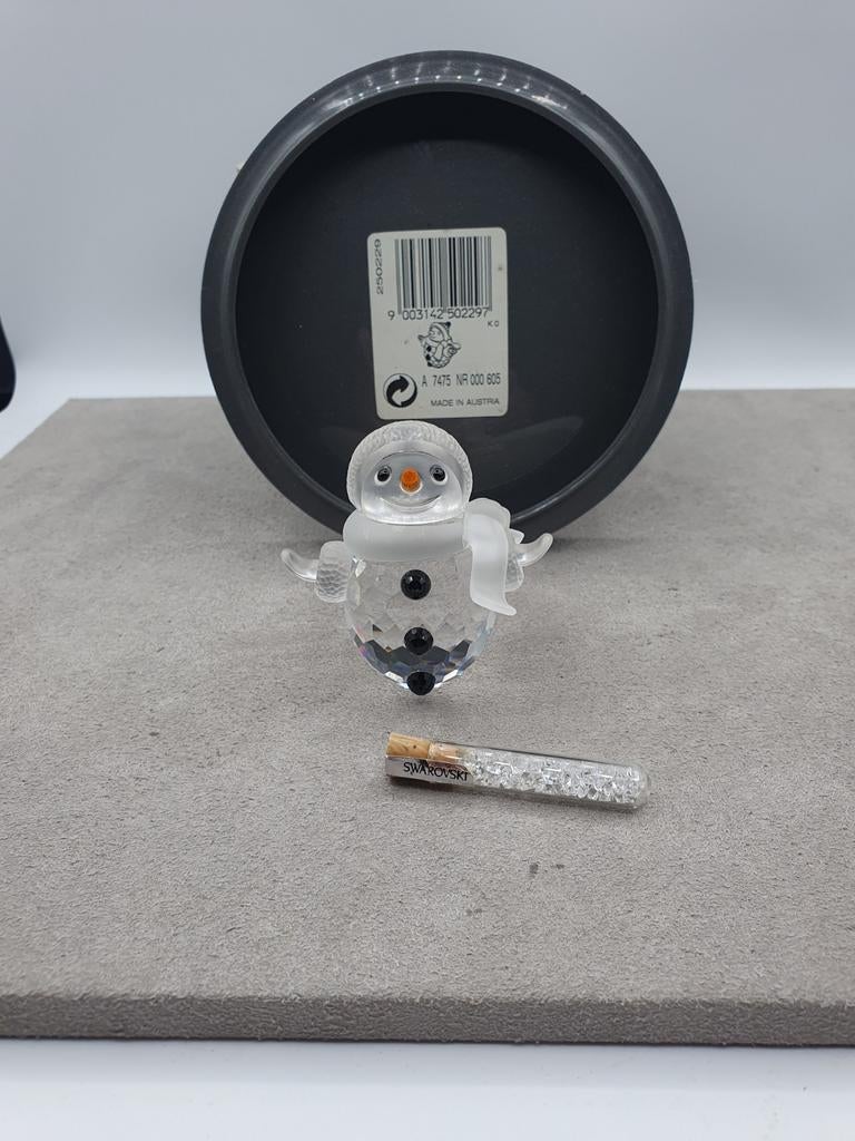 Swarovski Sneeuwman met buisje sneeuw., Verzamelen, Swarovski, Ophalen of Verzenden