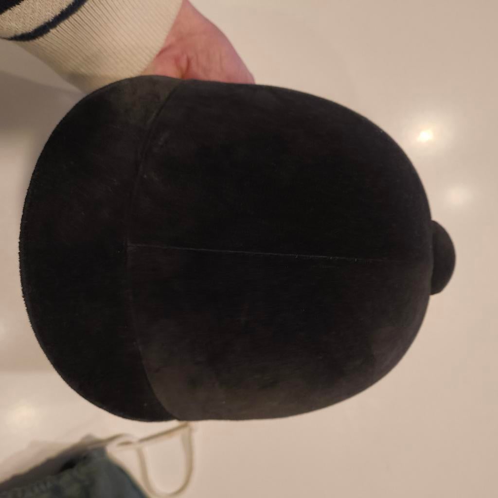 Paardrijhelm belstar (tok), Ophalen