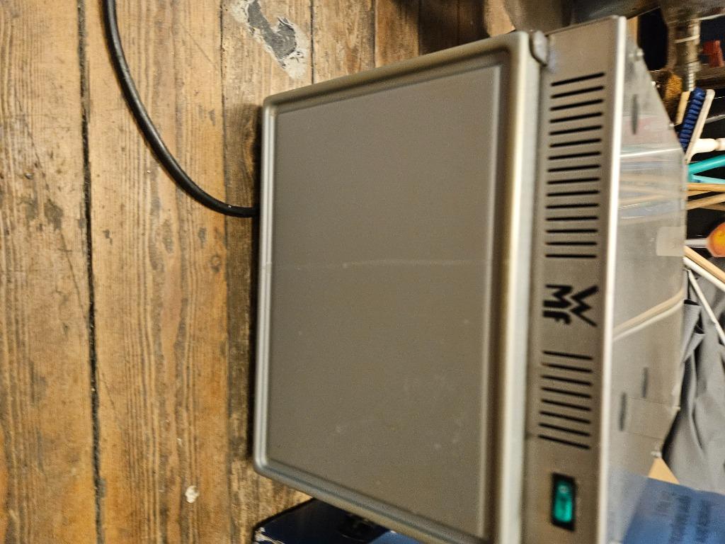 Wmf melkfrigo voor koffiemachine, Ophalen
