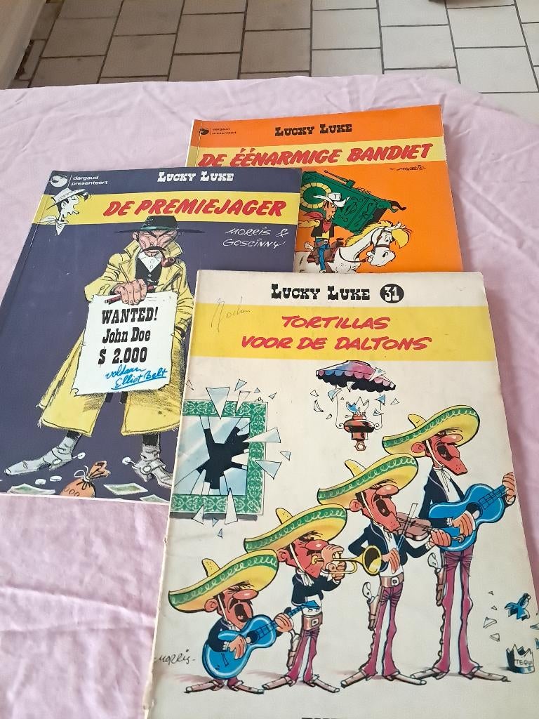 Strips : Lucky Luke, Gelezen, Ophalen of Verzenden, Morris, Meerdere stripboeken