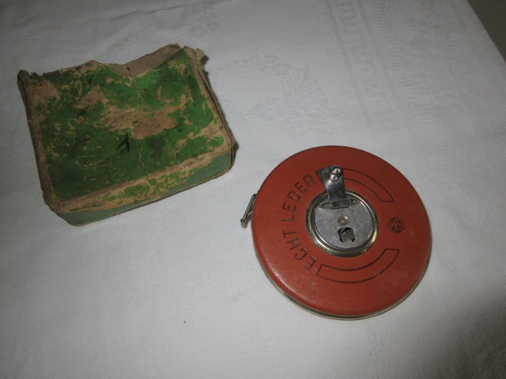 Oude rolmeter rolband lengte 20 m en echt leder buitenuit, Ophalen