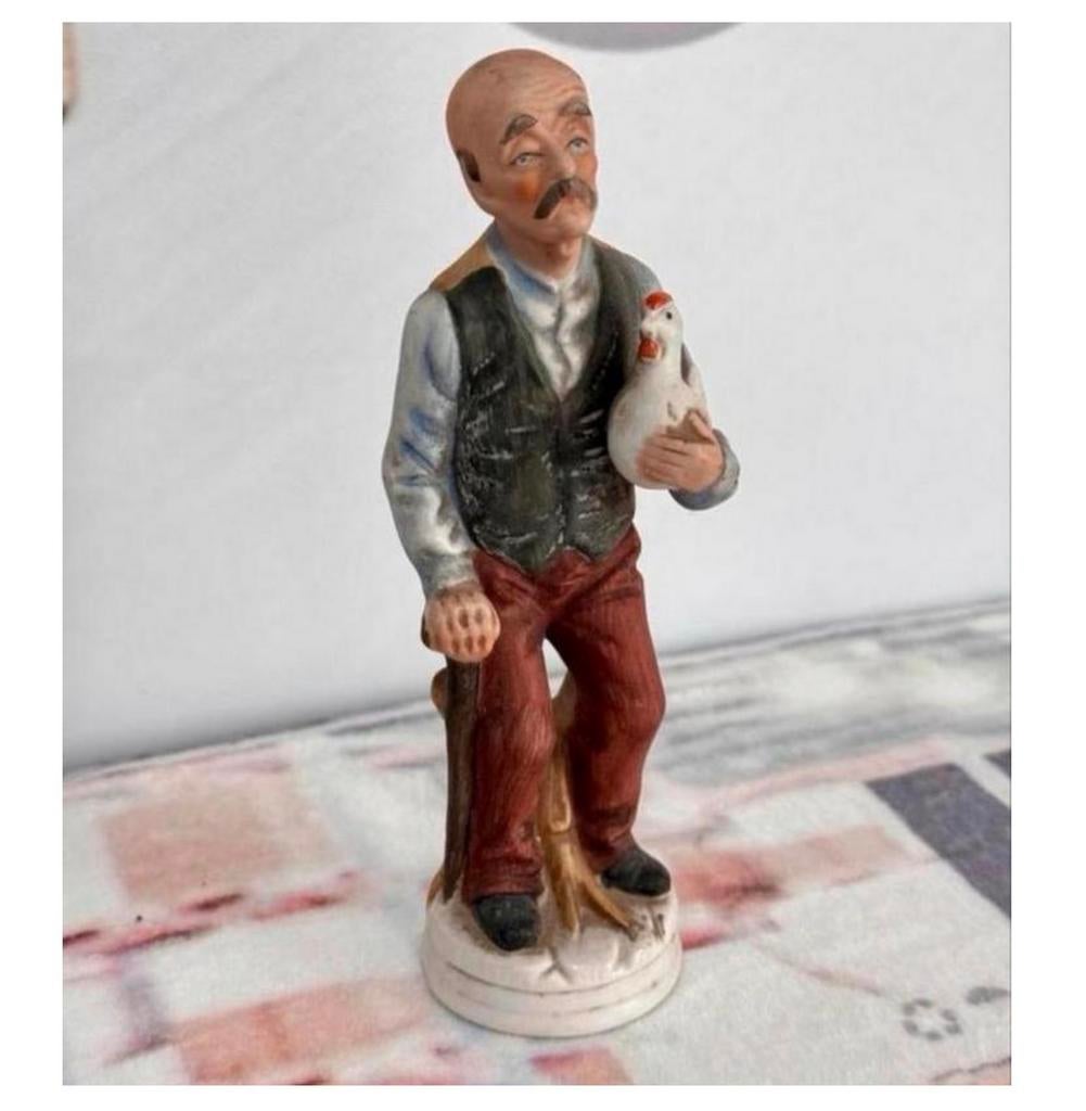 Figurine en porcelaine vintage 1990 Homme avec poulet 19CM, Collections, Enlèvement ou Envoi, Comme neuf, Humain