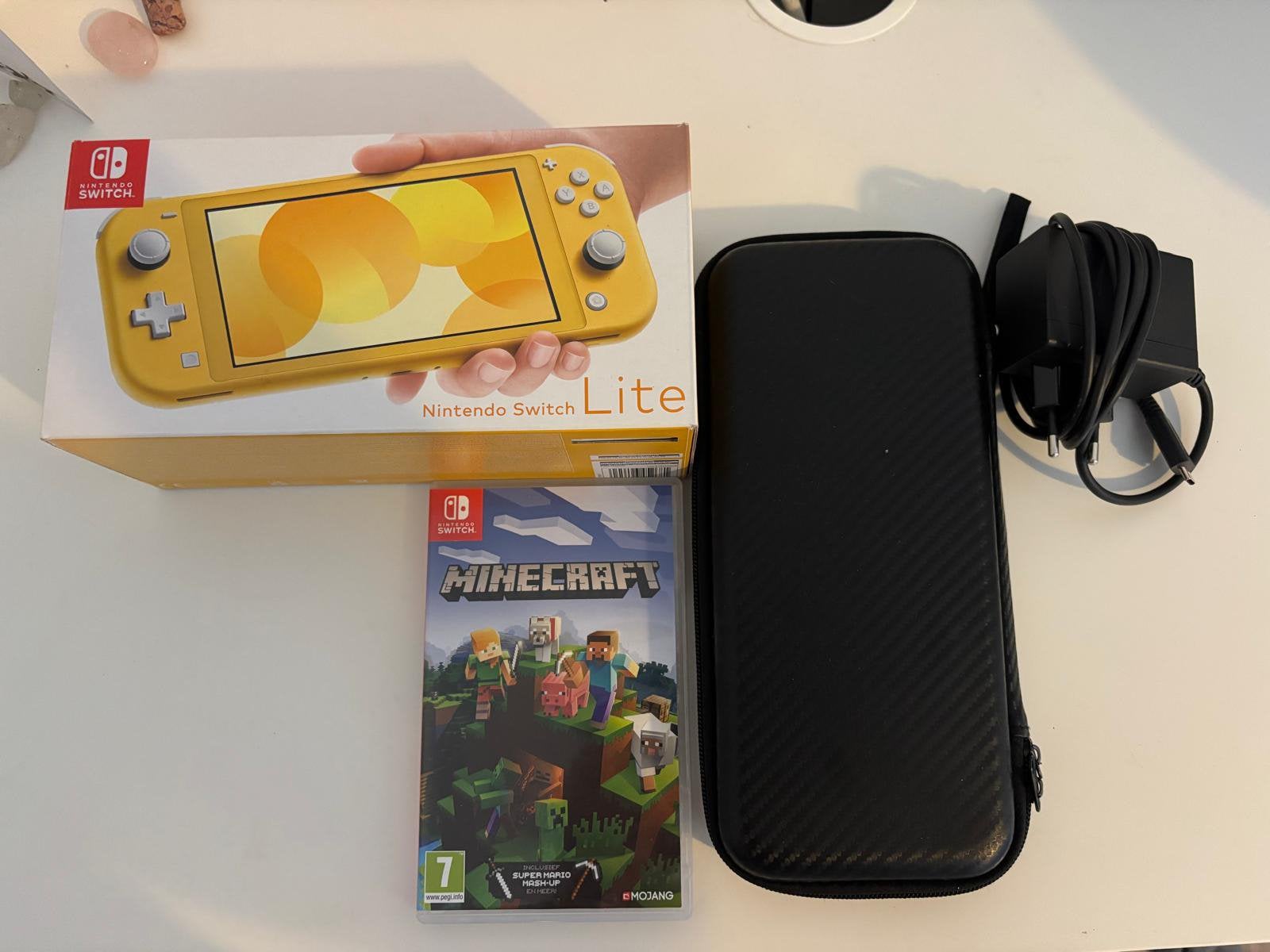 Nintento switch lite geel, Ophalen, Geel, Zo goed als nieuw, Met beschermhoes of tas