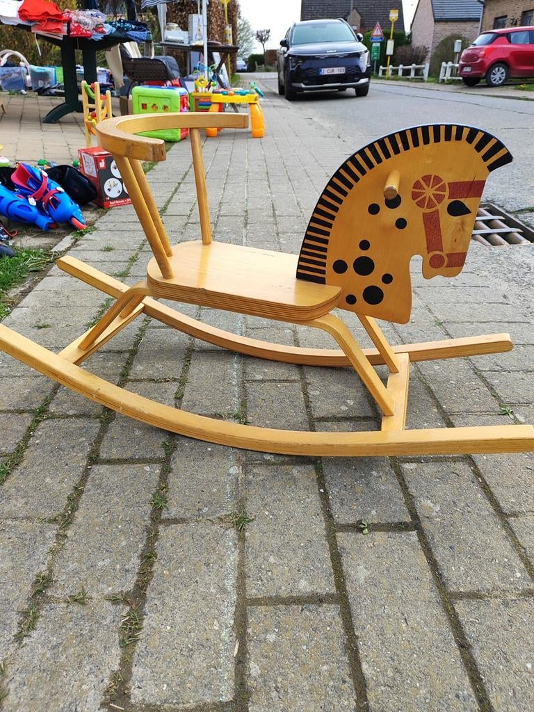 Cheval a bascule en bois, Ophalen