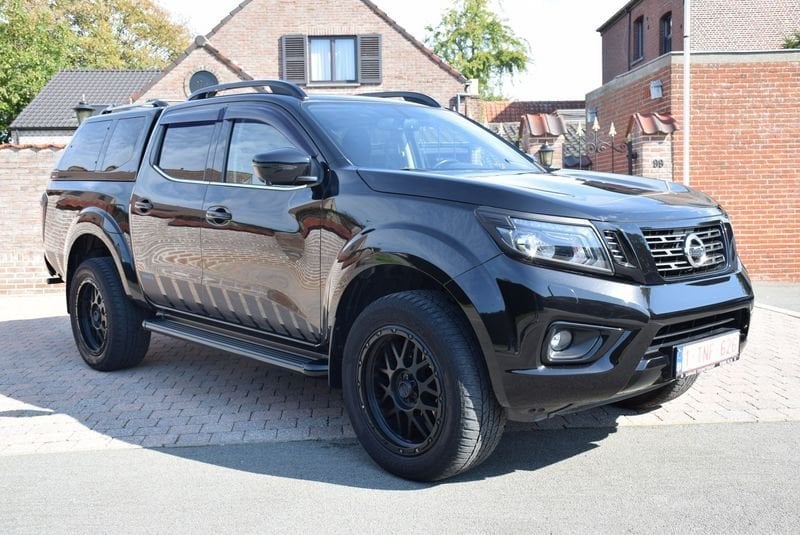 Nissan Navara dCi N-Guard Double Cab AUT, Auto's, Automaat, Gebruikt, 4 cilinders, Leder en Stof