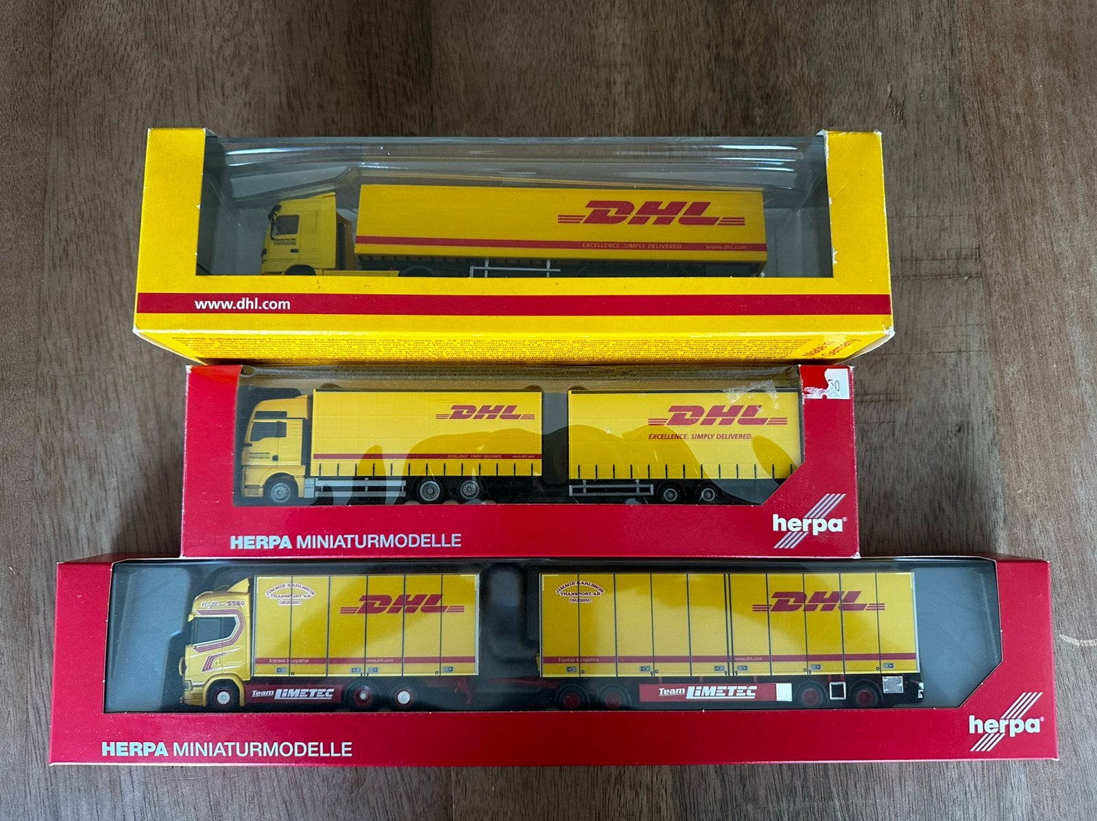 Herpa 1:87 DHL set inclusief zeldzame Jimmie Karlsson Scania, Ophalen, Zo goed als nieuw, Herpa