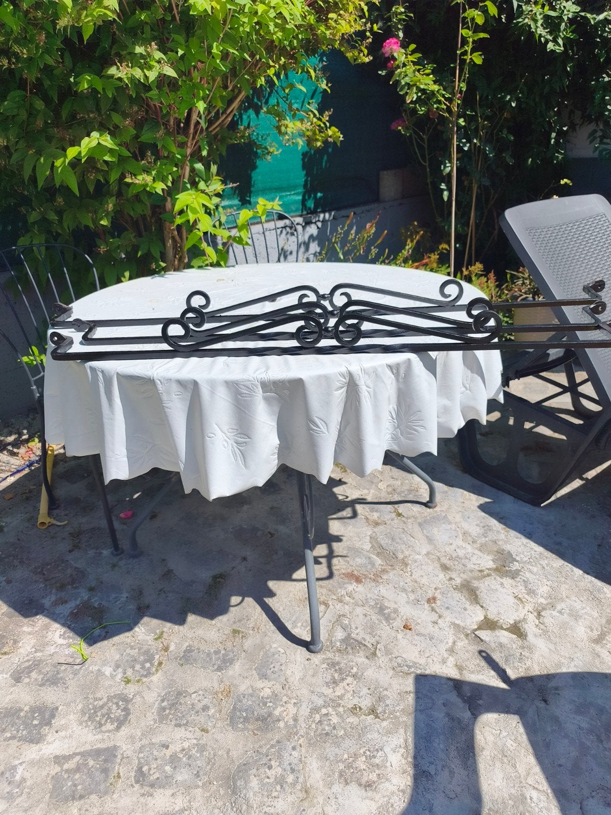 Grille en fer forgé, Tuin en Terras, Parasols