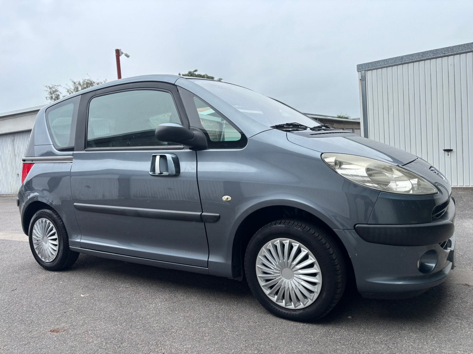Peugeot 1007 - 1.4 Benzine - 110 000 Km - Gekeurd, Auto's, Voorwielaandrijving, Stof, Blauw, Handgeschakeld