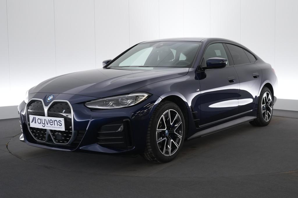 (2FJU966) BMW I4, Auto's, BMW, Achterwielaandrijving, Gebruikt, Blauw, Alcantara