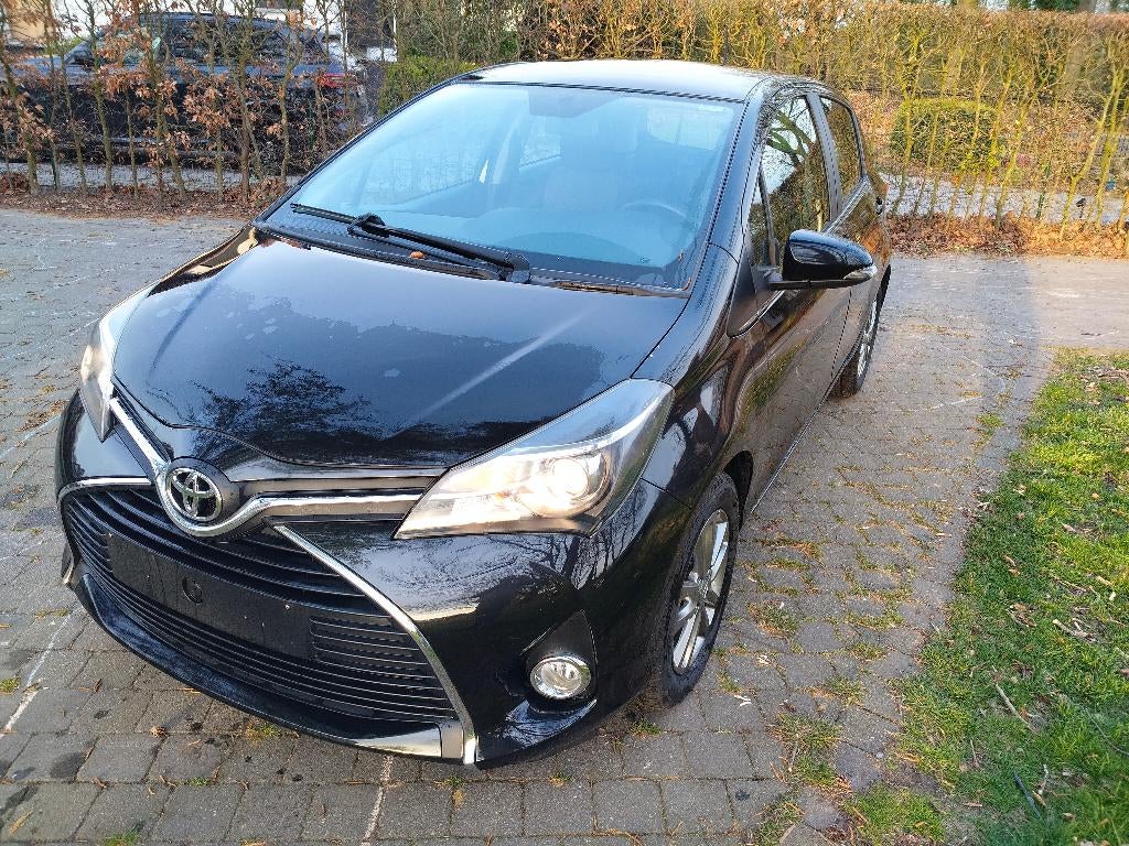 Toyota Yaris 1.33 VVTi 54333km (bj 2015) 1 jaar garantie !!!, Voorwielaandrijving, Euro 5, Stof, Zwart