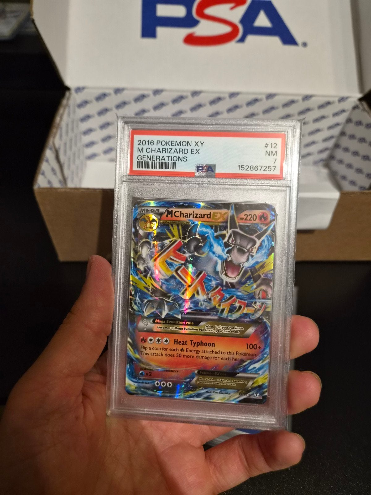 M Charizard EX PSA 7 Generations 12/83 New Cert, Ophalen of Verzenden, Zo goed als nieuw, Losse kaart, Foil