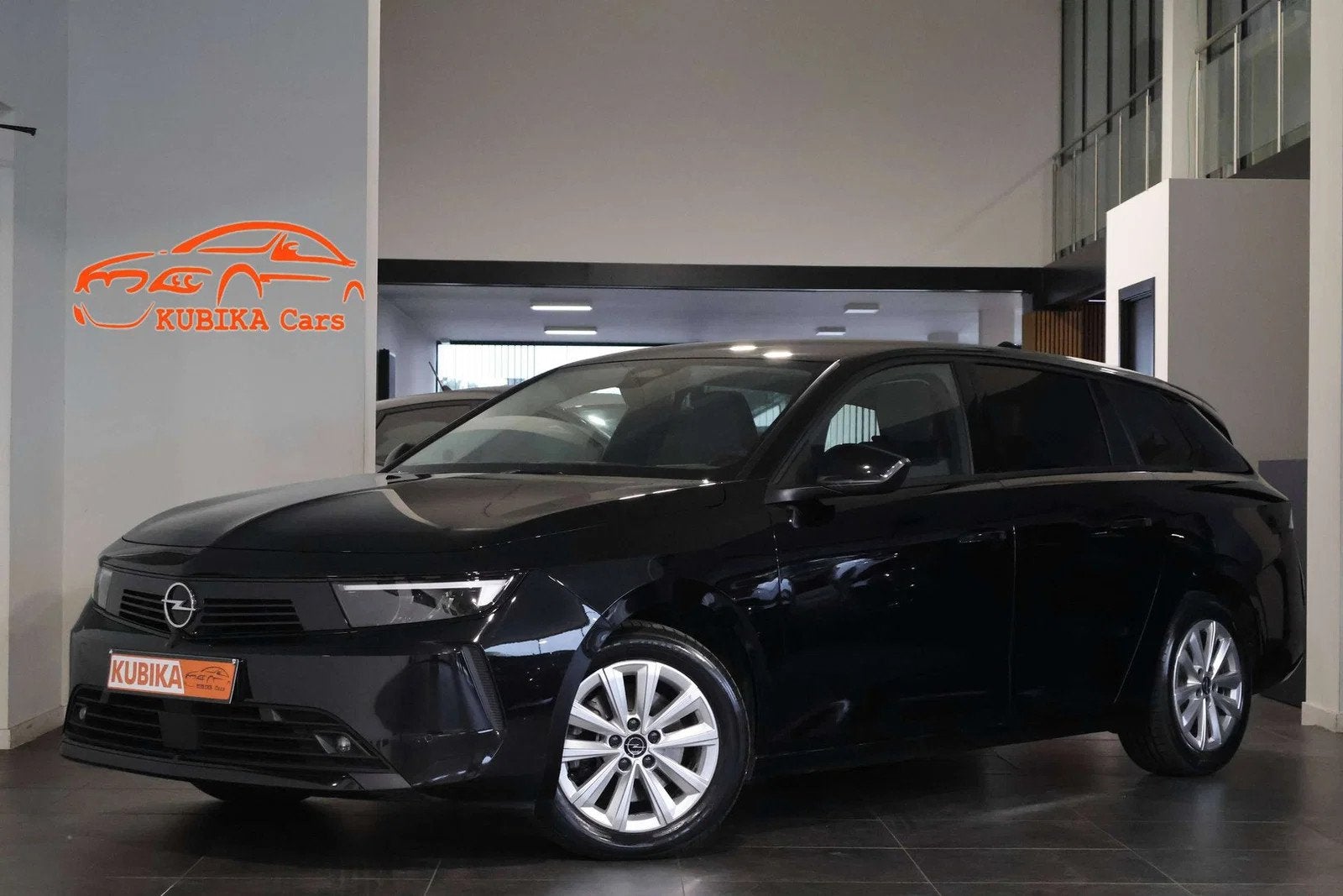 Opel Astra Astra Sports Tourer 1.2 Turbo LijnA Camera Garaan, Auto's, Stof, Gebruikt, 1199 cc, Zwart