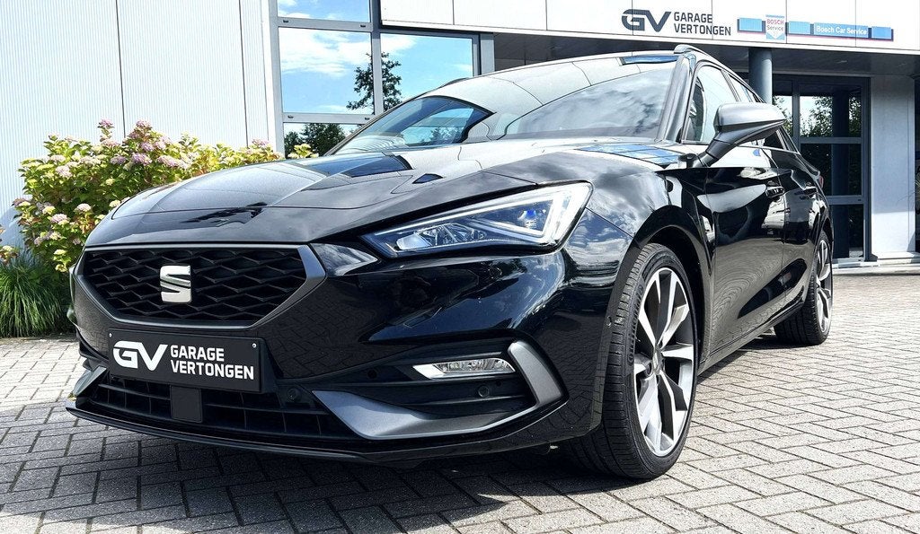 SEAT Leon ST e-Hybrid 1.4 TSI 150PK FR DSG *Zetelverw*stuurv, Auto's, Gebruikt, Leon, 2080 kg, Zwart