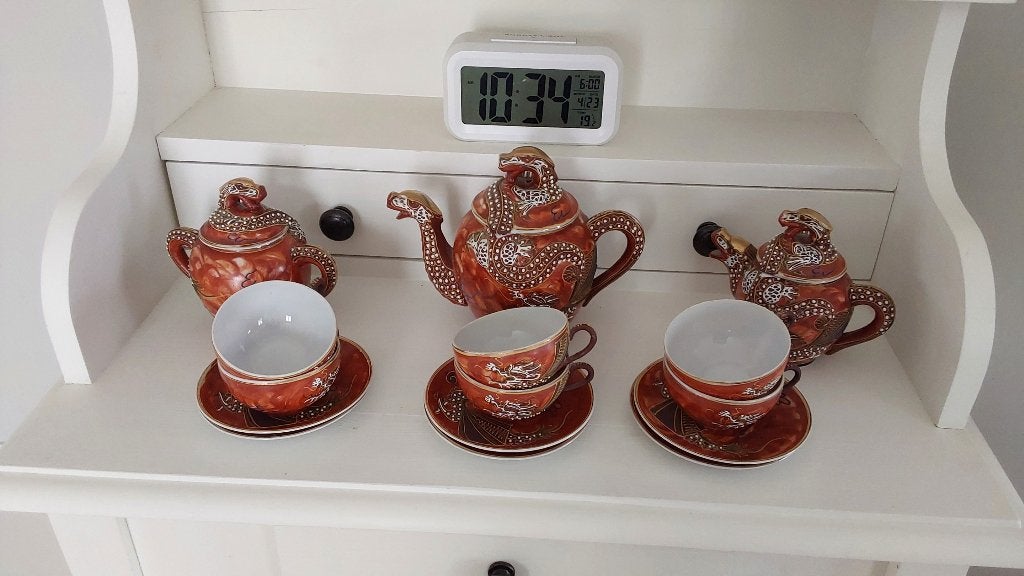 Porselein thee servies, Ophalen