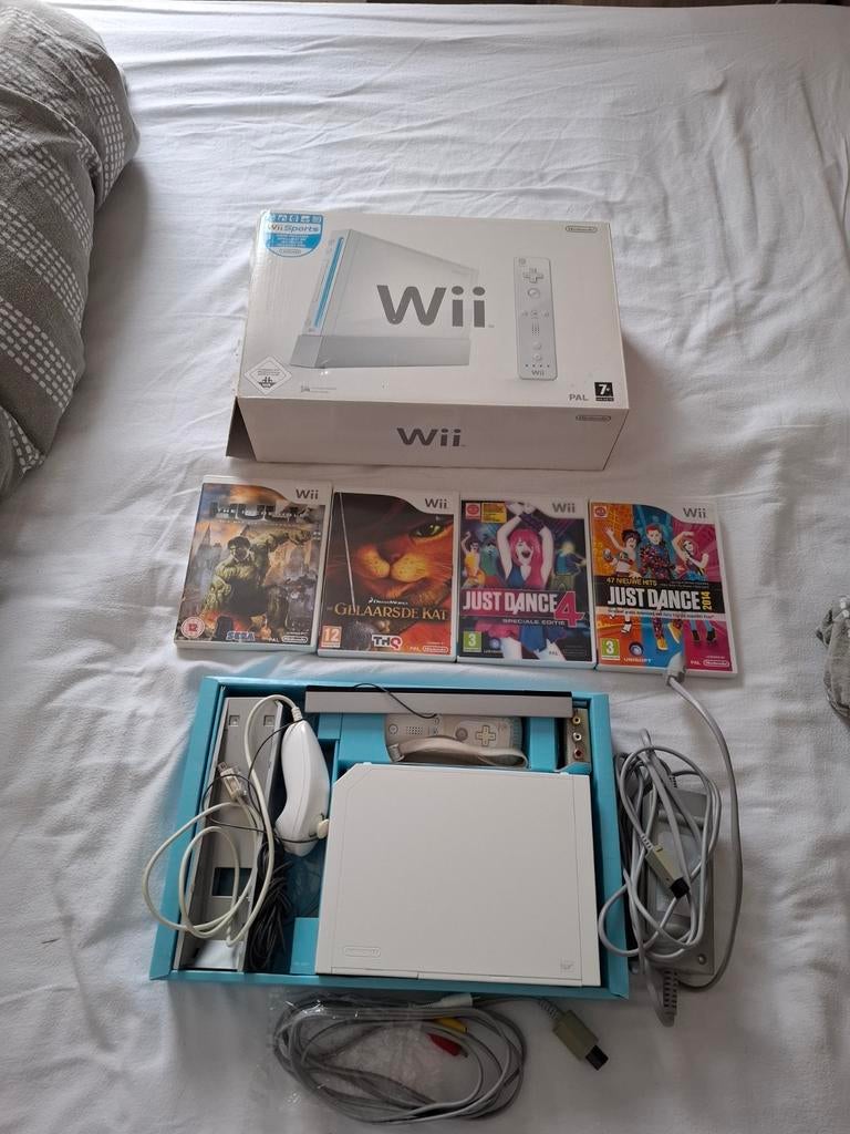 Wii console met 4 games, Ophalen