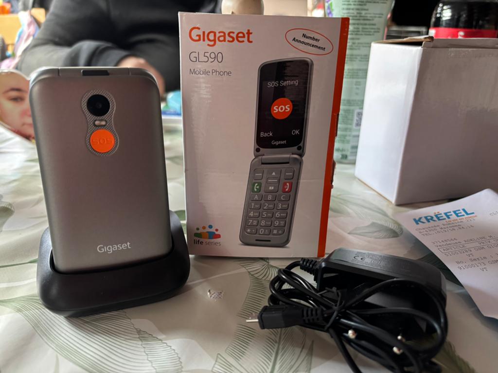 Téléphone clapet, Ophalen, Zo goed als nieuw