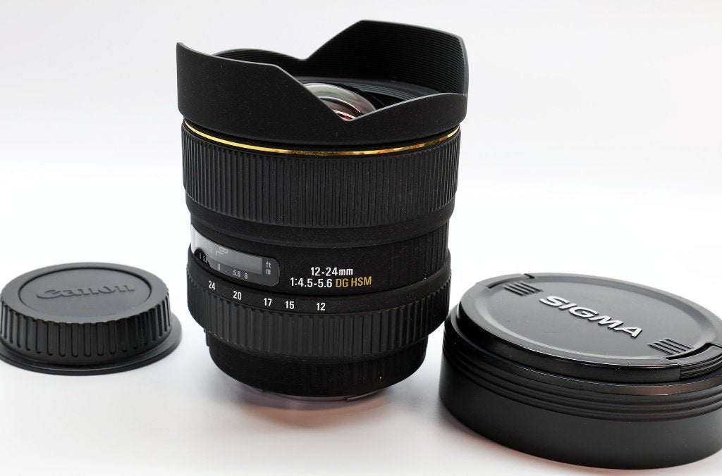 Sigma 12 - 24mm f4.5-5.6 EX DG HSM (Canon EF), Sigma, Zoom, Zo goed als nieuw, Canon EF