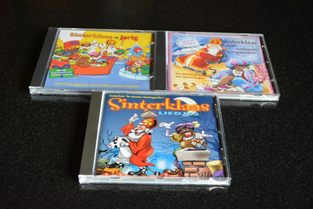 CD's Sinterklaasliedjes en boekje met CD Sinterklaas en kers, Enlèvement ou Envoi, Comme neuf, Saint-Nicolas