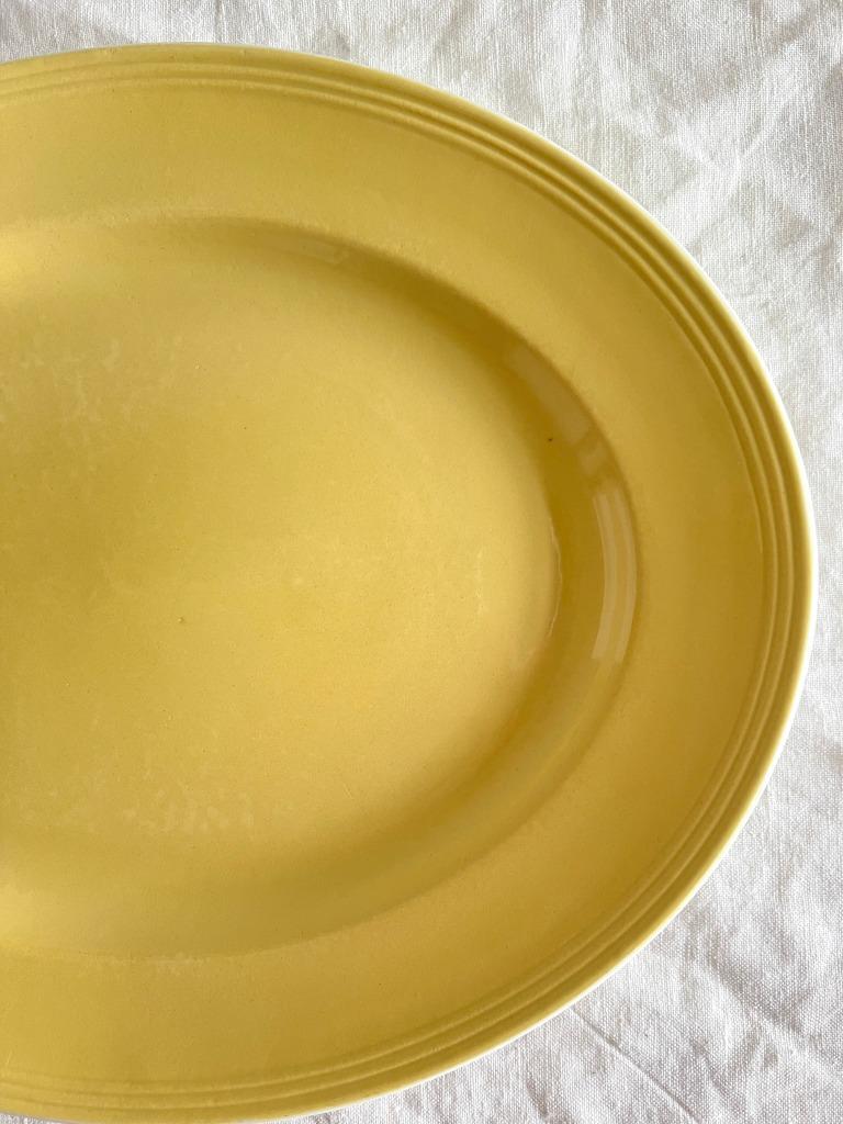 Plat ovale jaune Boch, Antiquités & Art, Enlèvement ou Envoi