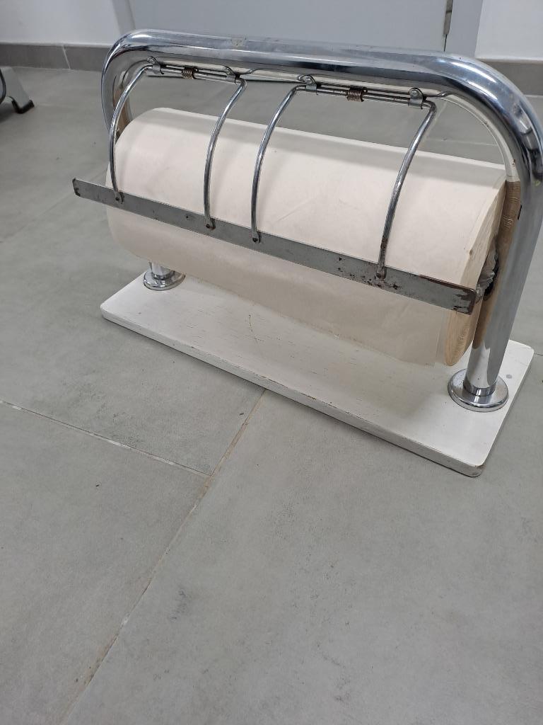 papierrolhouder, Ophalen
