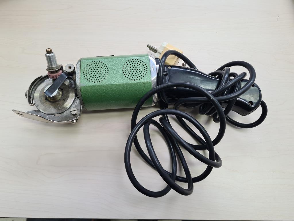 snijmachine voor stoffen electrisch, Ophalen