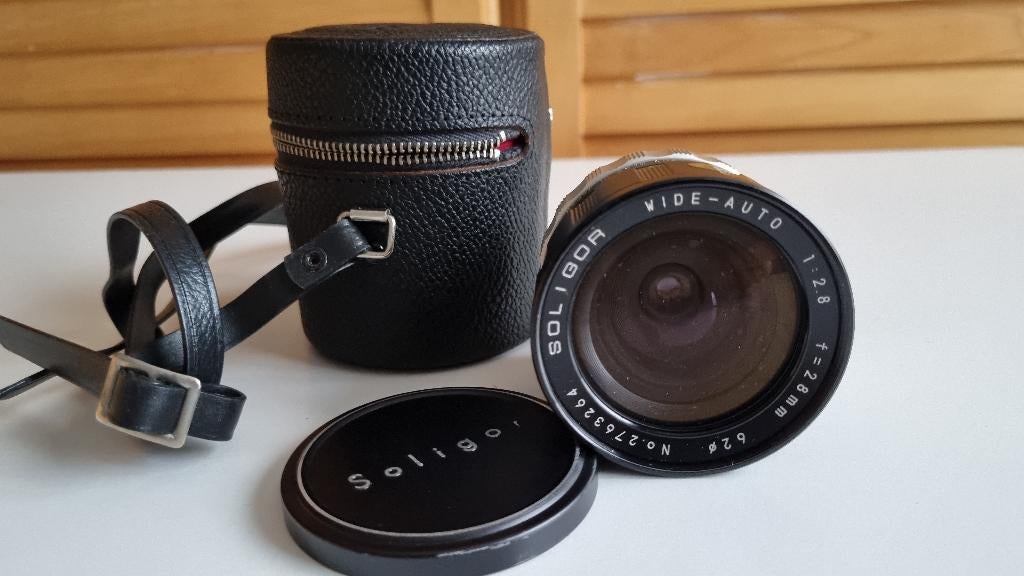 Soligor 28mm f2.8 groothoeklens  met Minolta vatting, Audio, Tv en Foto, Fotocamera's Analoog, Ophalen of Verzenden, Zo goed als nieuw