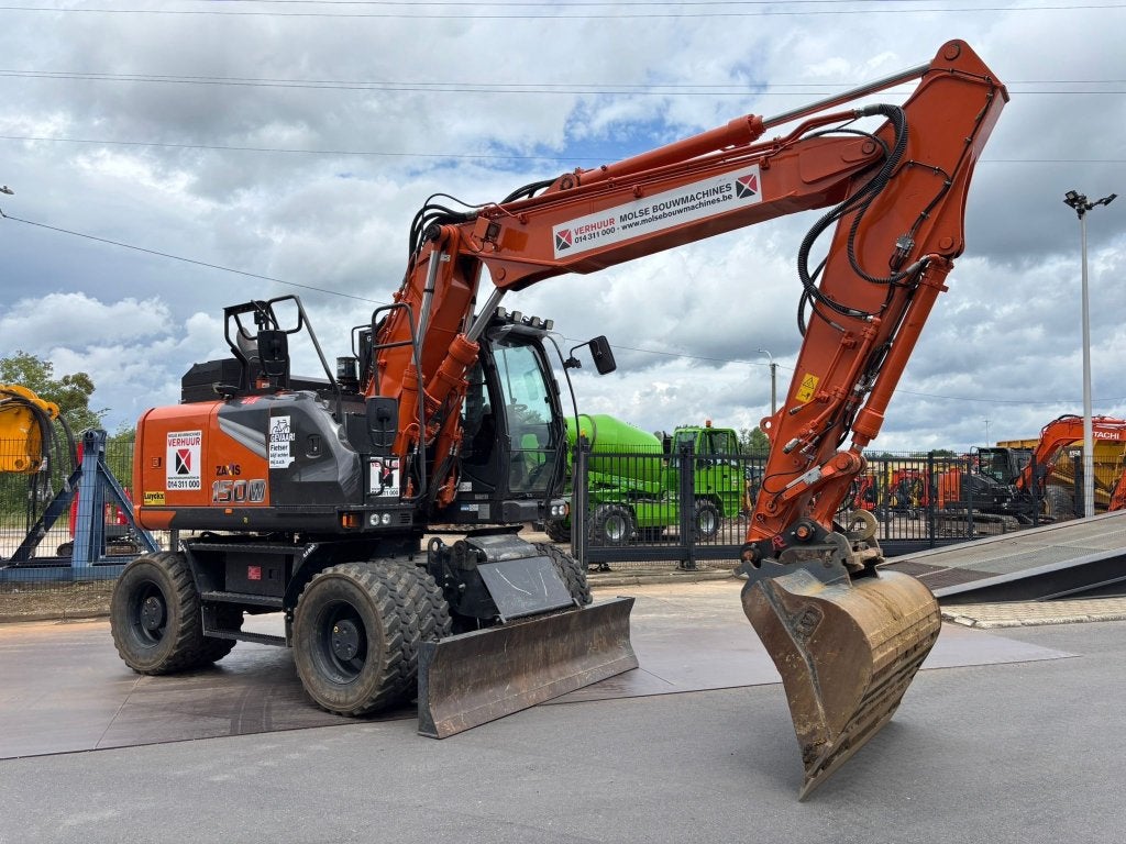 Grue à pneus Hitachi ZX150W-7 (2.850h), Articles professionnels, Machines & Construction | Grues & Excavatrices, Enlèvement, Excavatrice