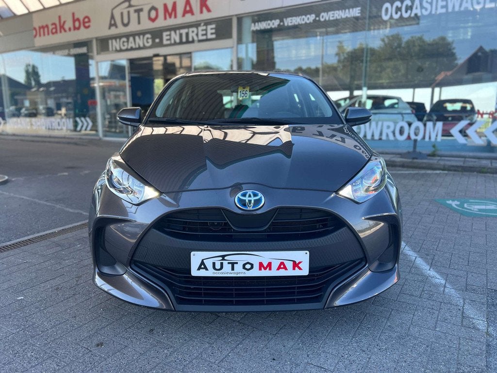Toyota Yaris Yaris 1.5 Hsd Hybrid Dynamic (bj 2021), Auto's, Parkeersensor, Stof, Gebruikt, Euro 6
