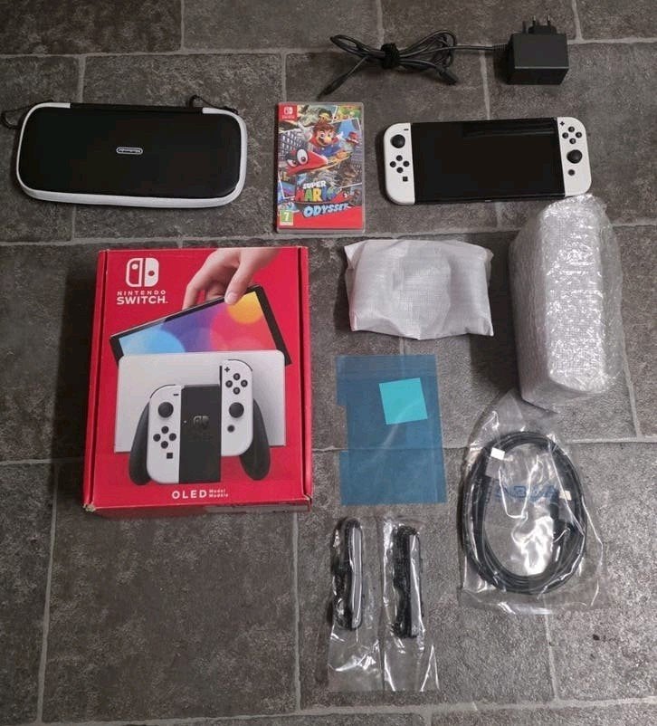 Nintendo Switch OLED Blanche + Jeu Mario odyssey, Ophalen, Switch OLED