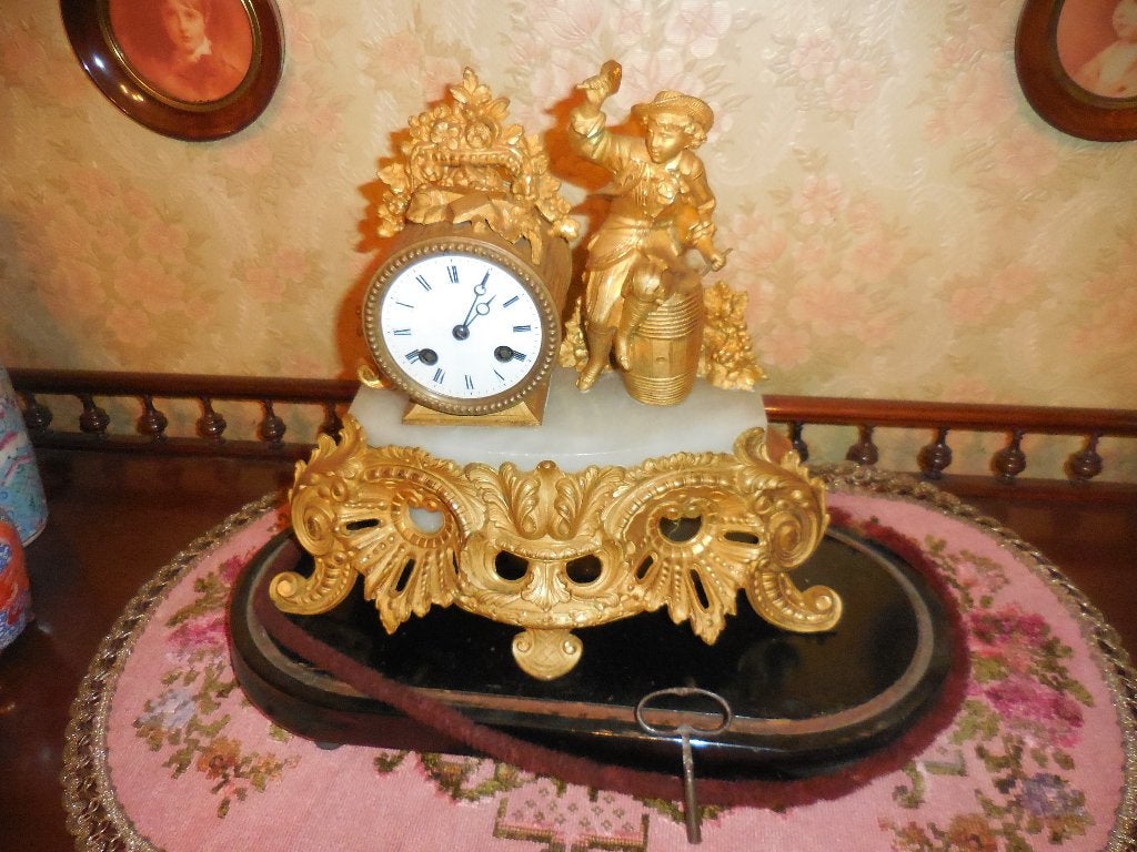 Oude klok met wereldbol, Antiek en Kunst, Ophalen of Verzenden