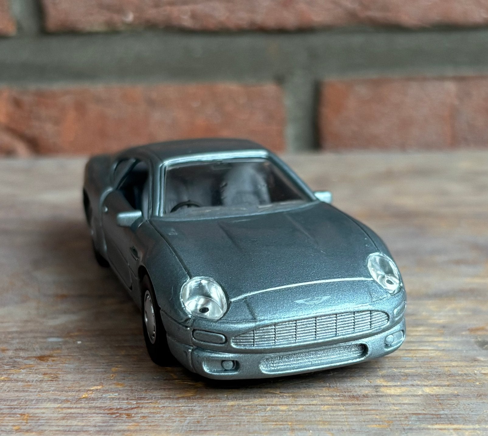 Maisto Shell Aston Martin DB7 - schaal 1:40, Ophalen of Verzenden, Gebruikt, Auto