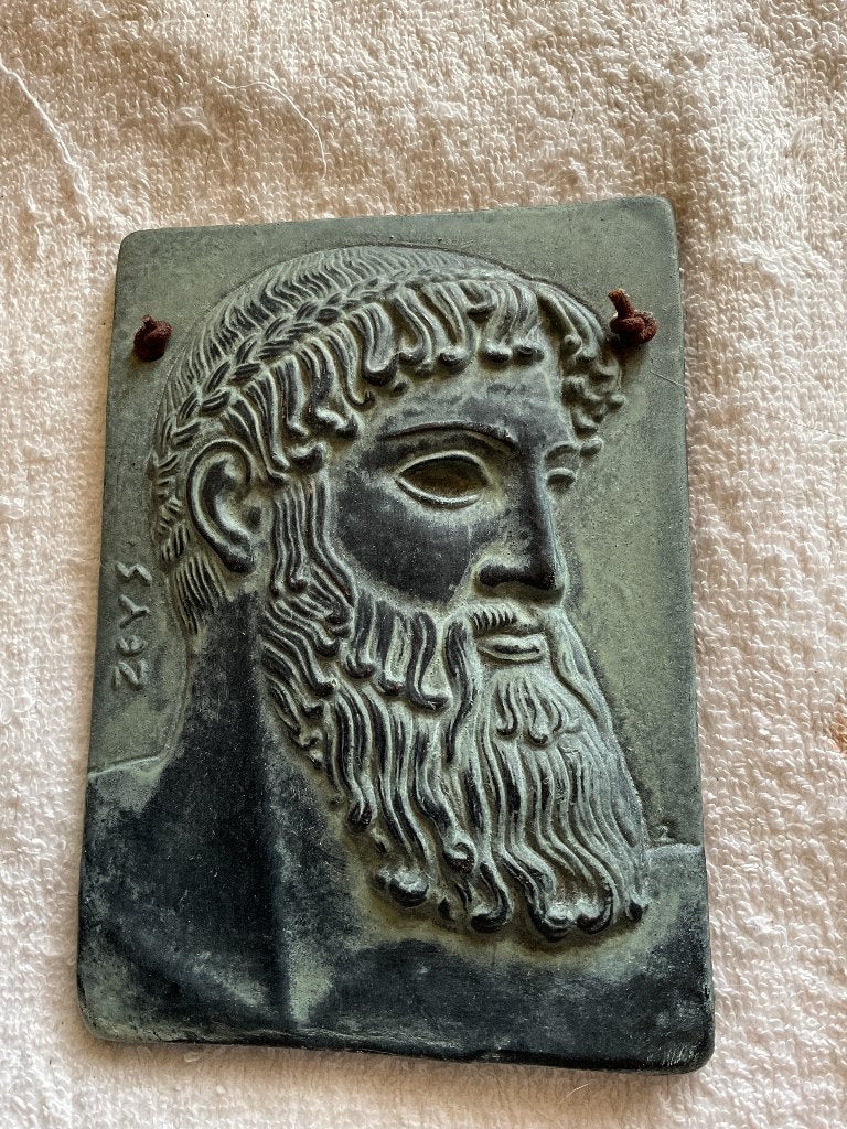 Wandplaquette van Zeus, Ophalen