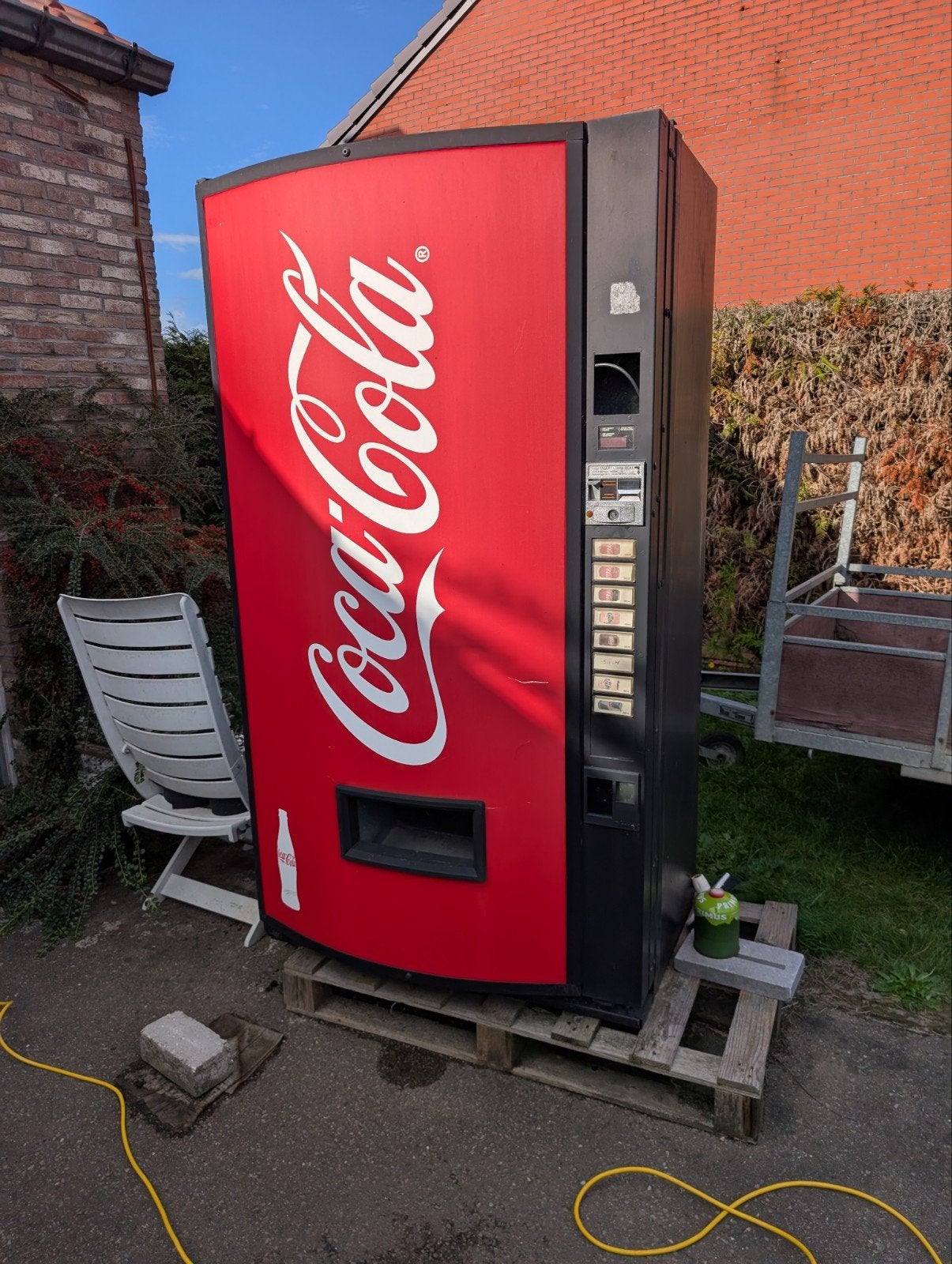 Coca Cola automaat, Ophalen
