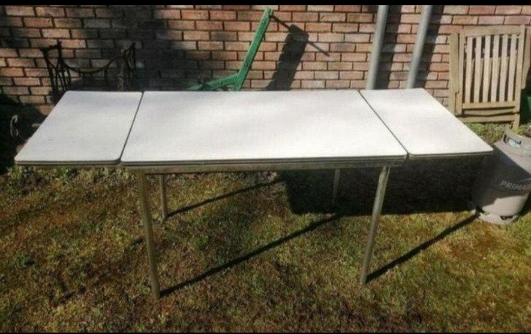 Uitschuifbare tafel, Ophalen