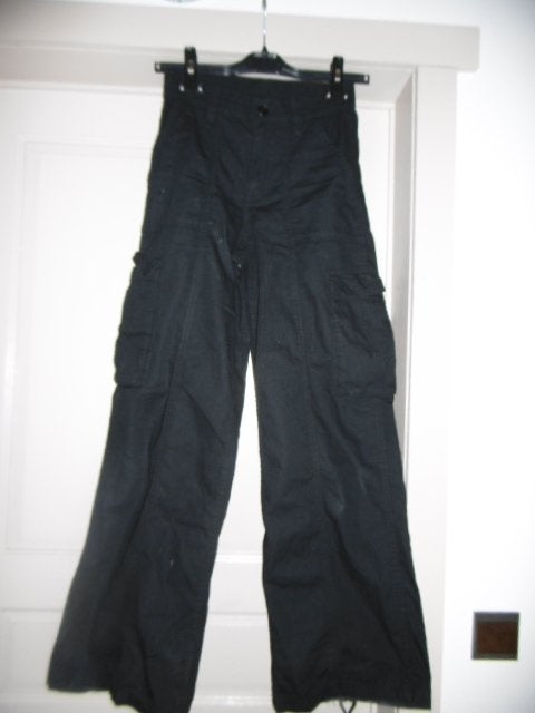 zwarte broek maat XS. 14 jaar of 164., Enfants & Bébés, Vêtements enfant | Taille 164, Enlèvement ou Envoi, Comme neuf, Groggy