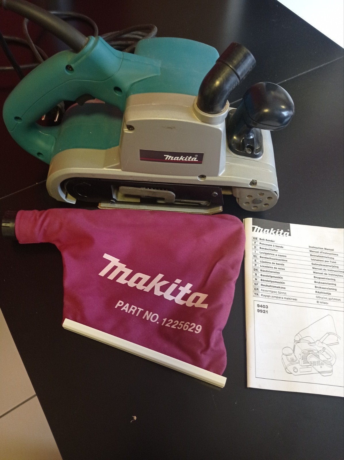 Makita schuurmachine, Ophalen