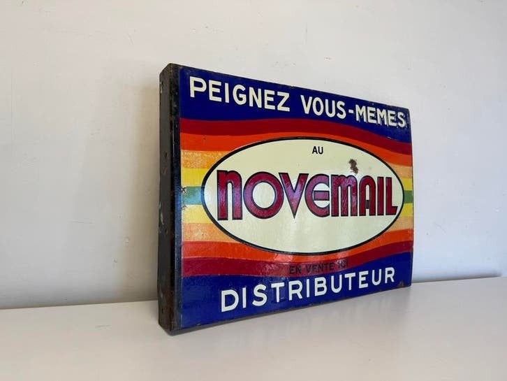 Vintage ge?mailleerd Novemail reclamebord