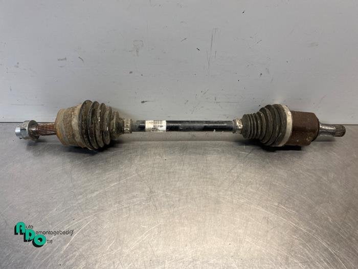 Arbre de transmission avant gauche d'un Opel Corsa (Corsa E, -, Opel, 3 mois de garantie, Utilisé