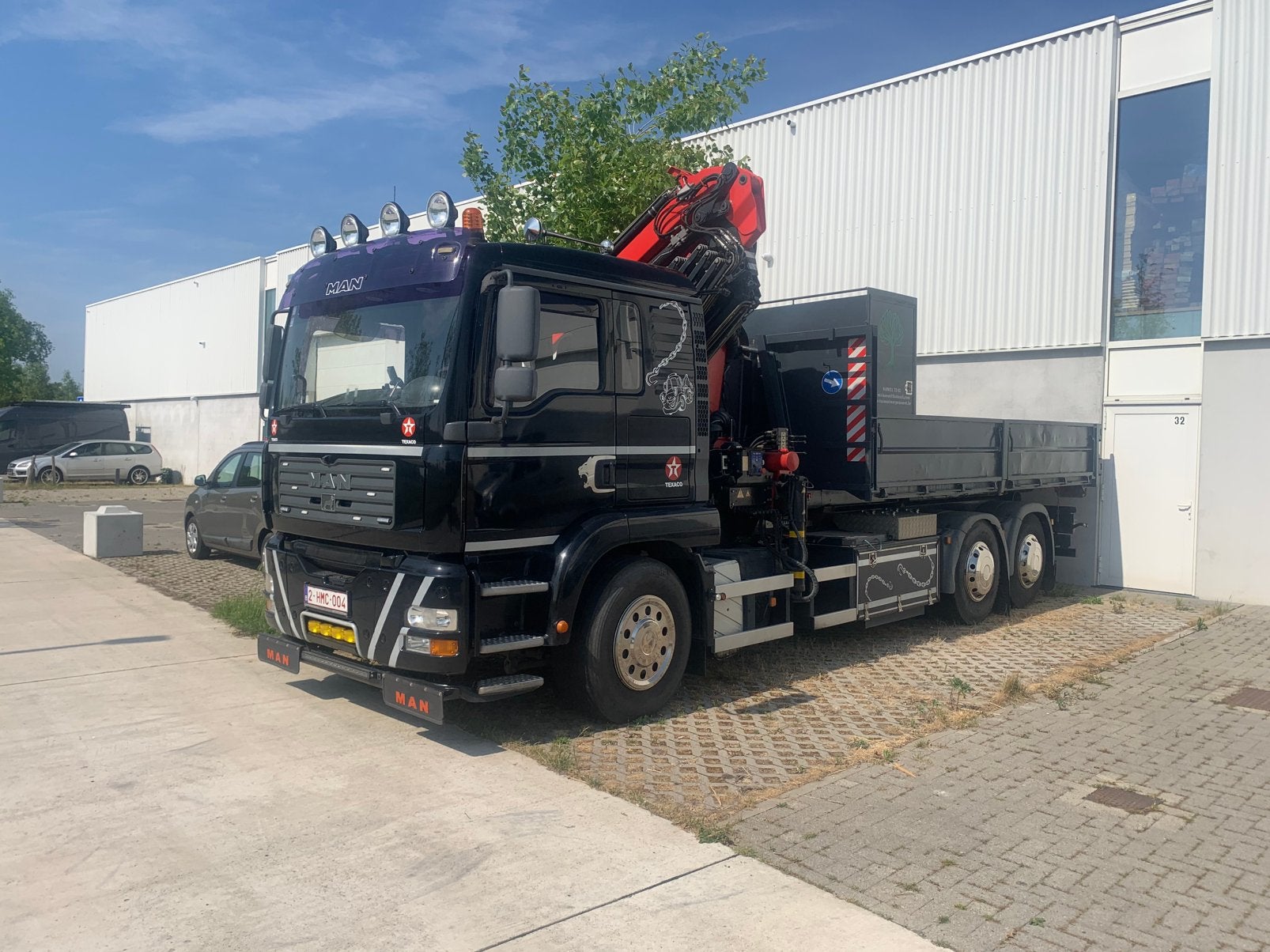 MAN TGA 26 ton met HMF 2220 K4 kraan, container + gest. as, Auto's, Vrachtwagens, Zwart, MAN, Zwart, Particulier