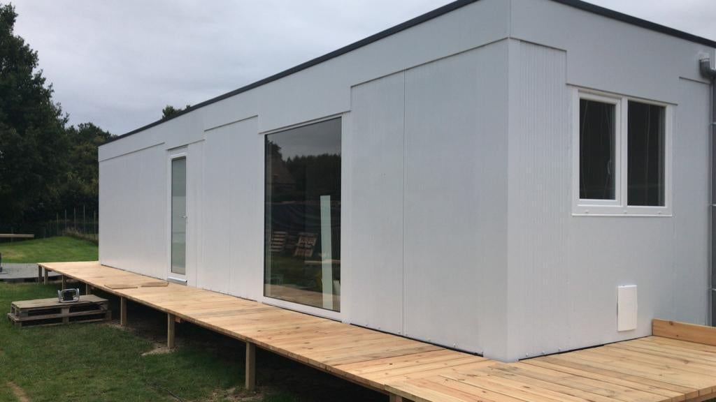 Twee woonunits van 6 op 3m=12 m lang, Ophalen