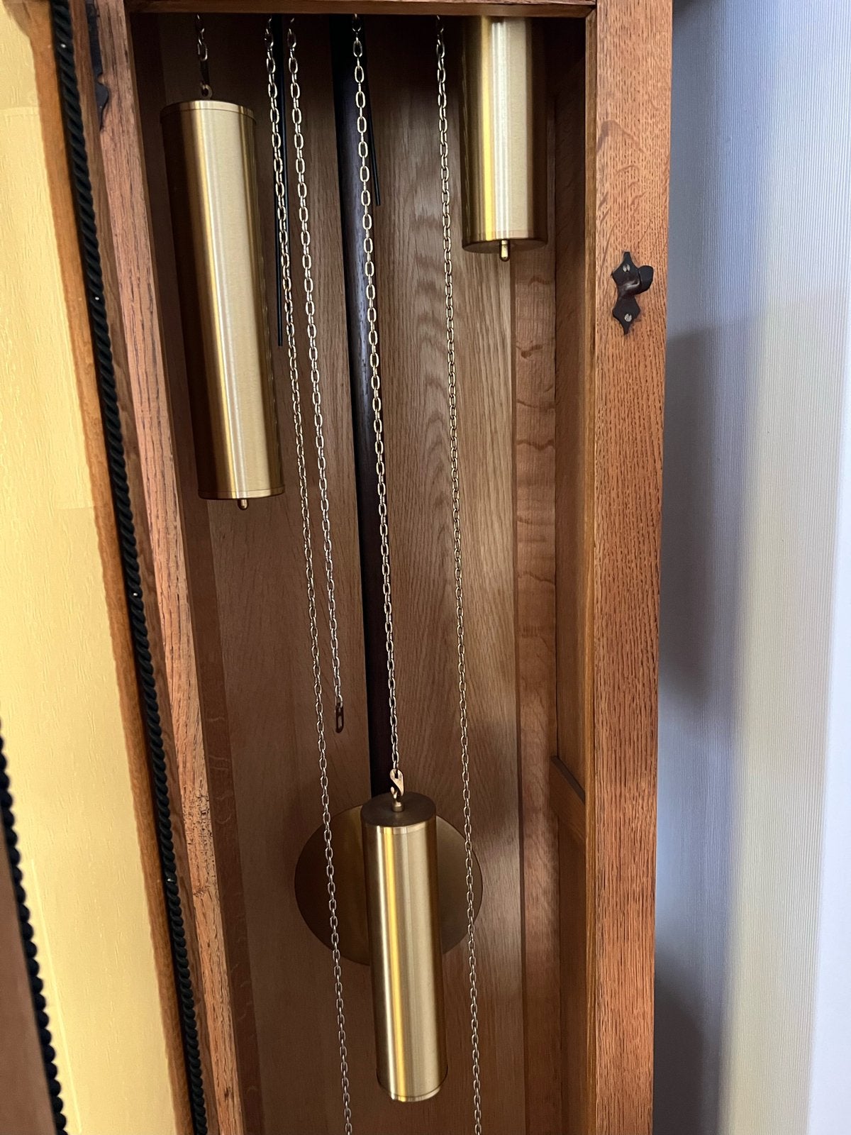 Antieke houten staande klok, Ophalen